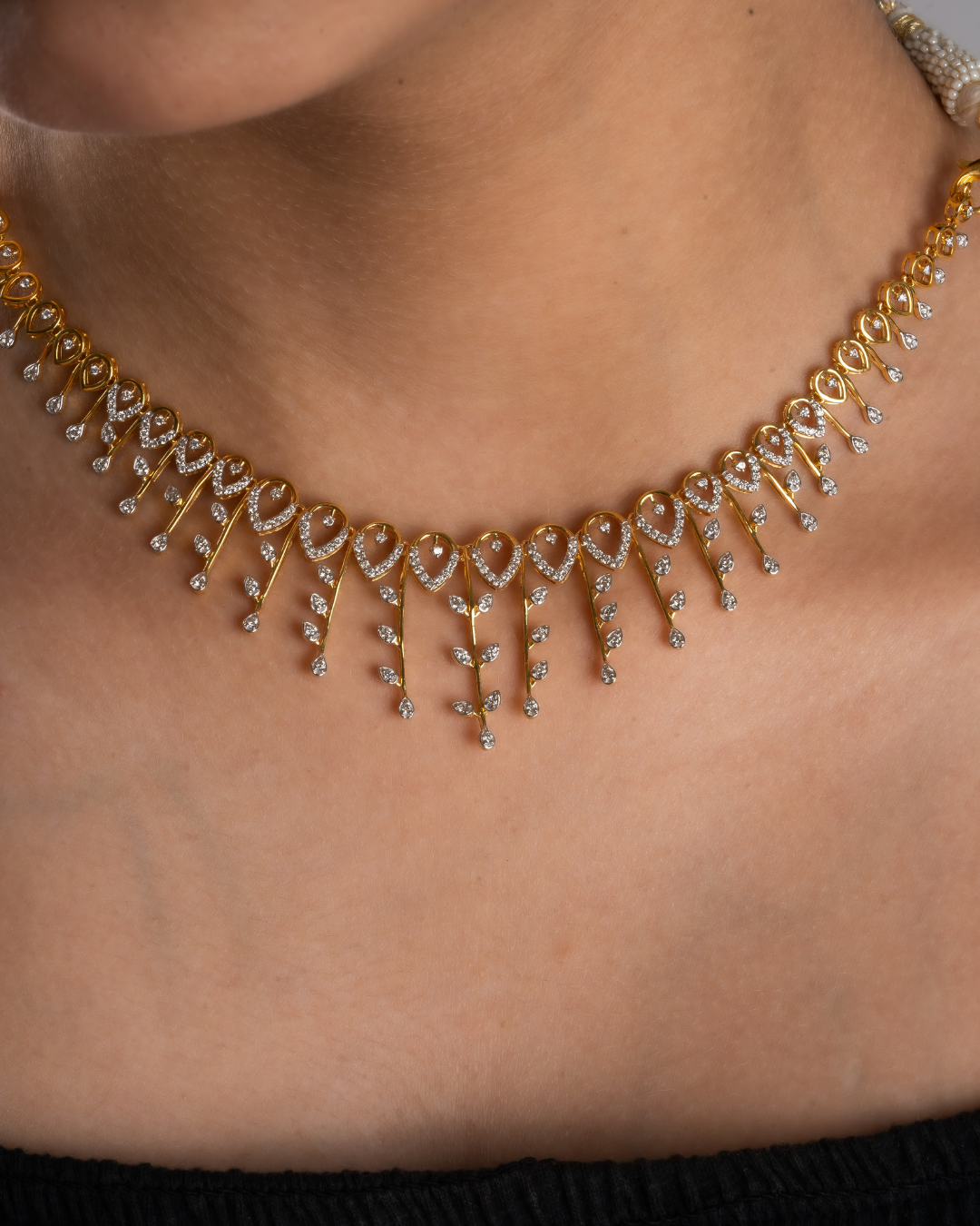 Leafy stem diamond necklace